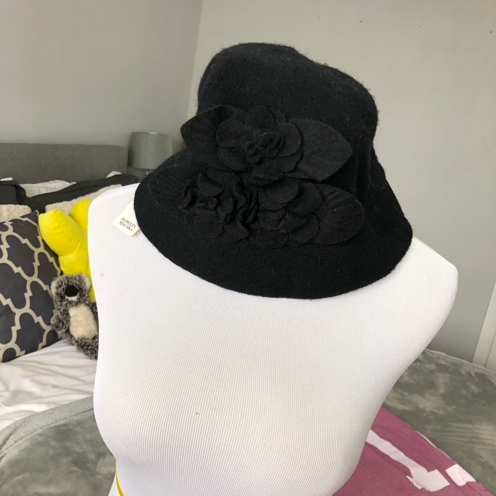 Woman’s black hat with design / Badgley Mischka